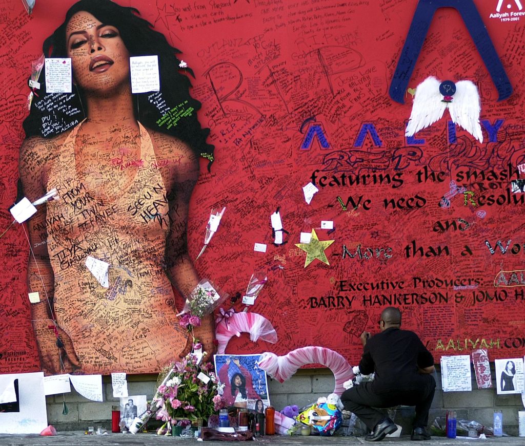 Aaliyah Fans Sign Mural In Tribute