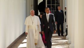 President Obama and Pope Walking To Office