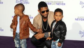 Singer Usher arrives with his children a