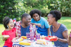 African American mixed race family at July 4th picnic