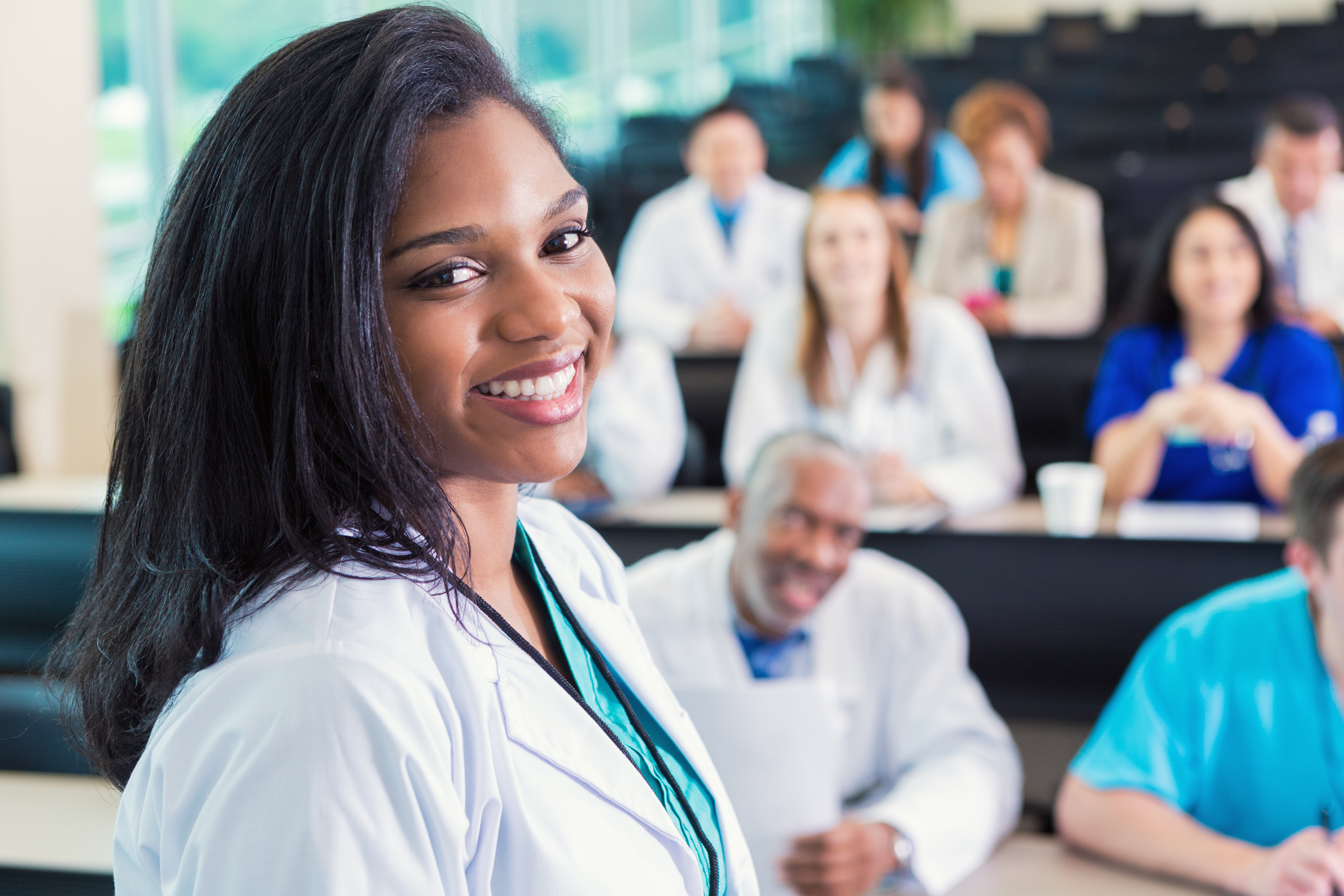 African American doctor or medical professional attending healthcare conference