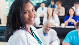African American doctor or medical professional attending healthcare conference