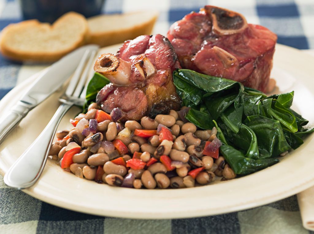 Southern New Year's meal with greens, beans, and ham hocks