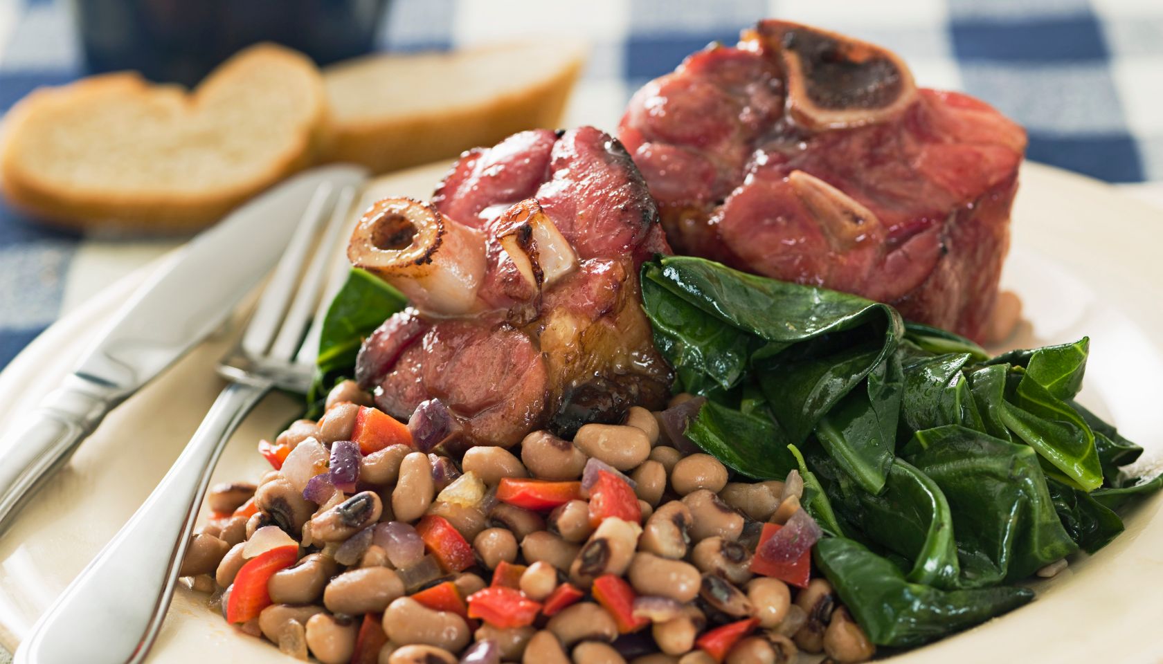 Southern New Year's meal with greens, beans, and ham hocks