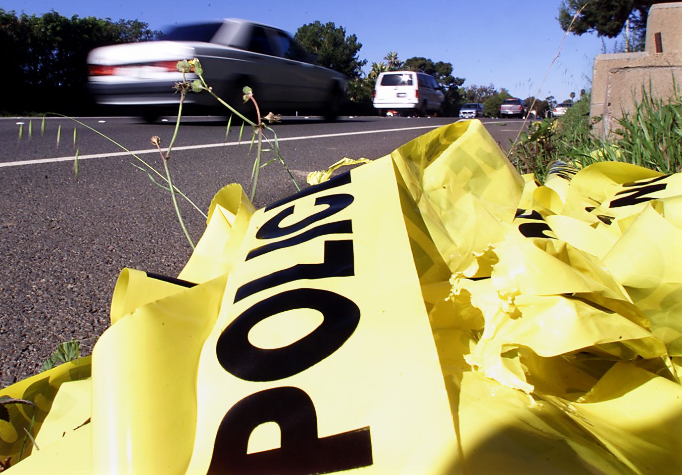 Laguna BeachNorthbound traffic and yellow police tape on the side of the road is all that's left n