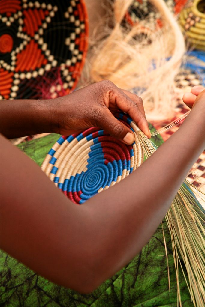 African women demonstrating basket weaving, International Folk Art Market, Santa Fe, New Mexico, USA