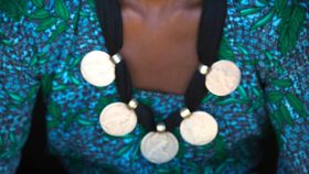 Portrait of an Oromo woman with maria theresa thalers necklace, Amhara region, Kemise, Ethiopia
