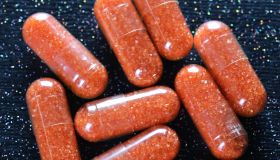 Orange colored prescription capsules