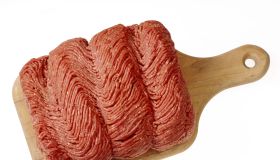 Raw ground beef on cutting board