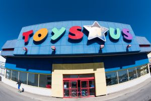 Toys R Us store facade in daytime. Toys 'R' Us, Inc. is an...