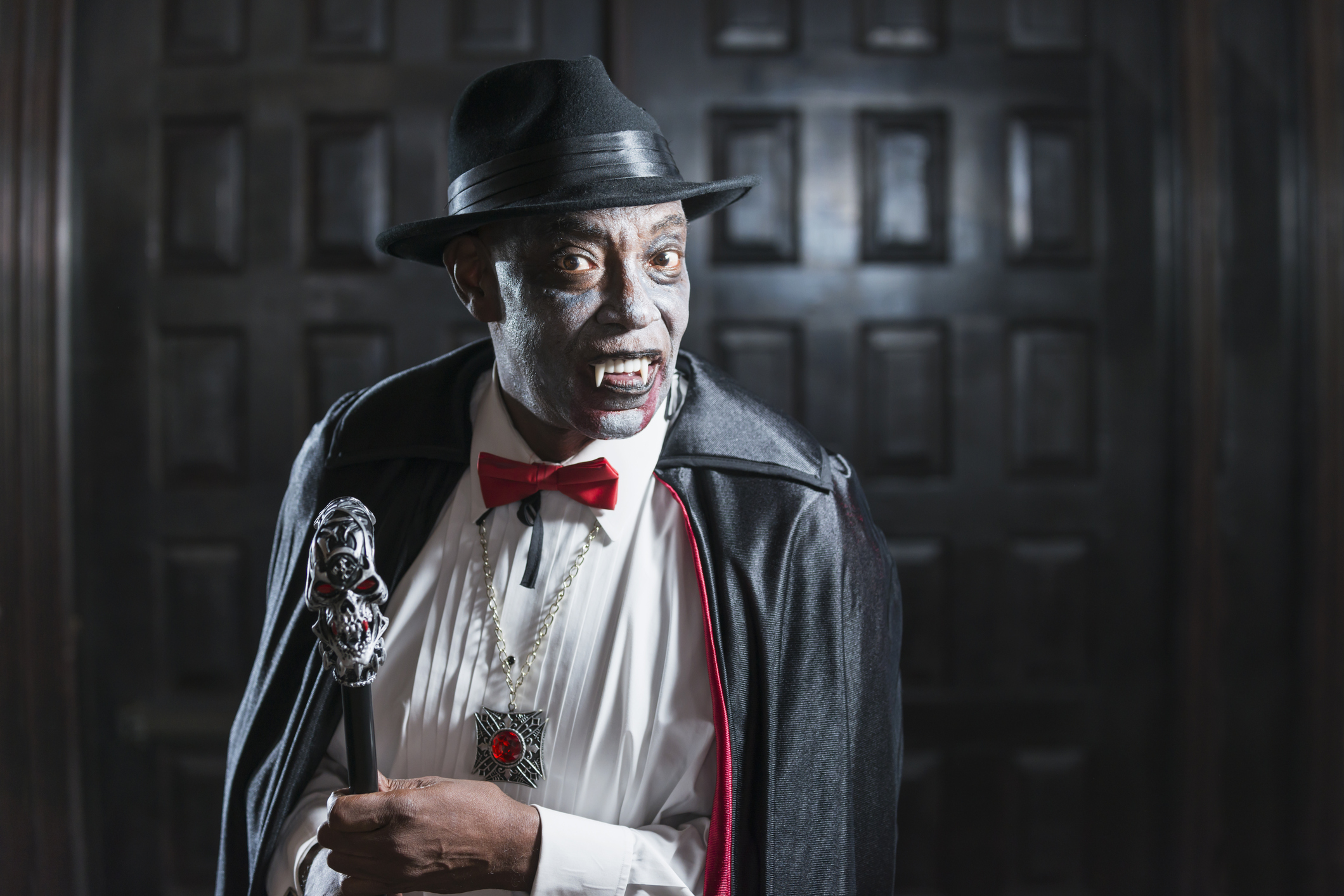 Vampire at adult halloween party