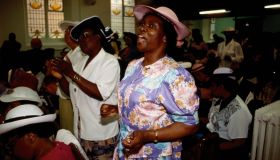 Women Singing During Church Service