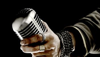 Man holding microphone, close-up