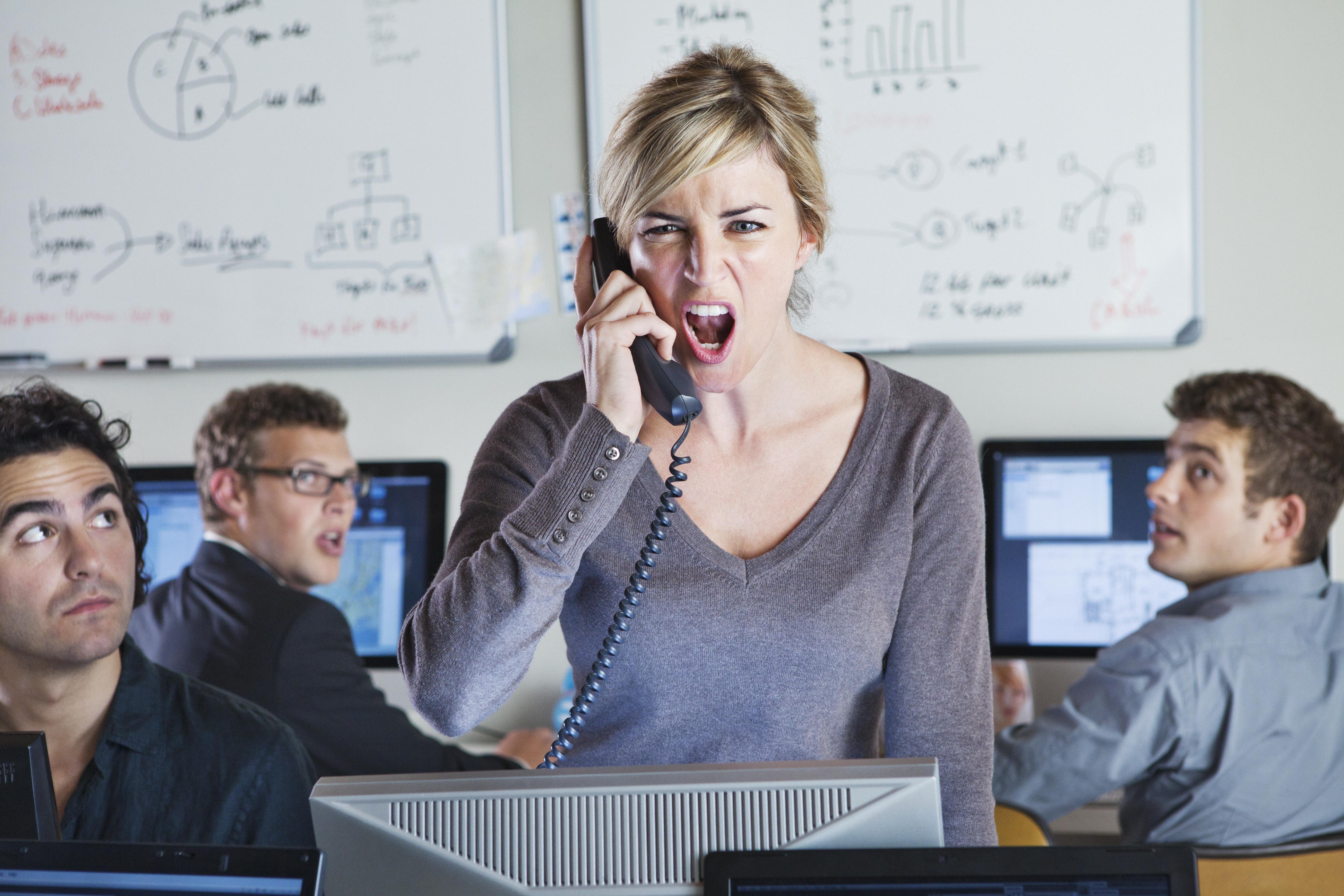 Angry woman shouting on the phone