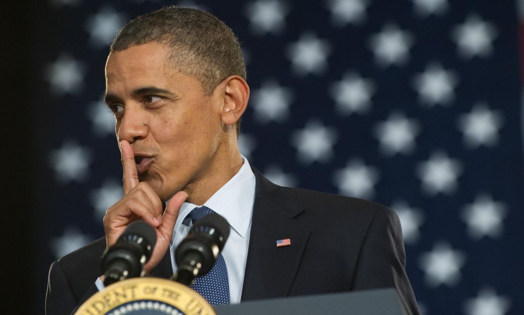 US President Barack Obama gestures for t