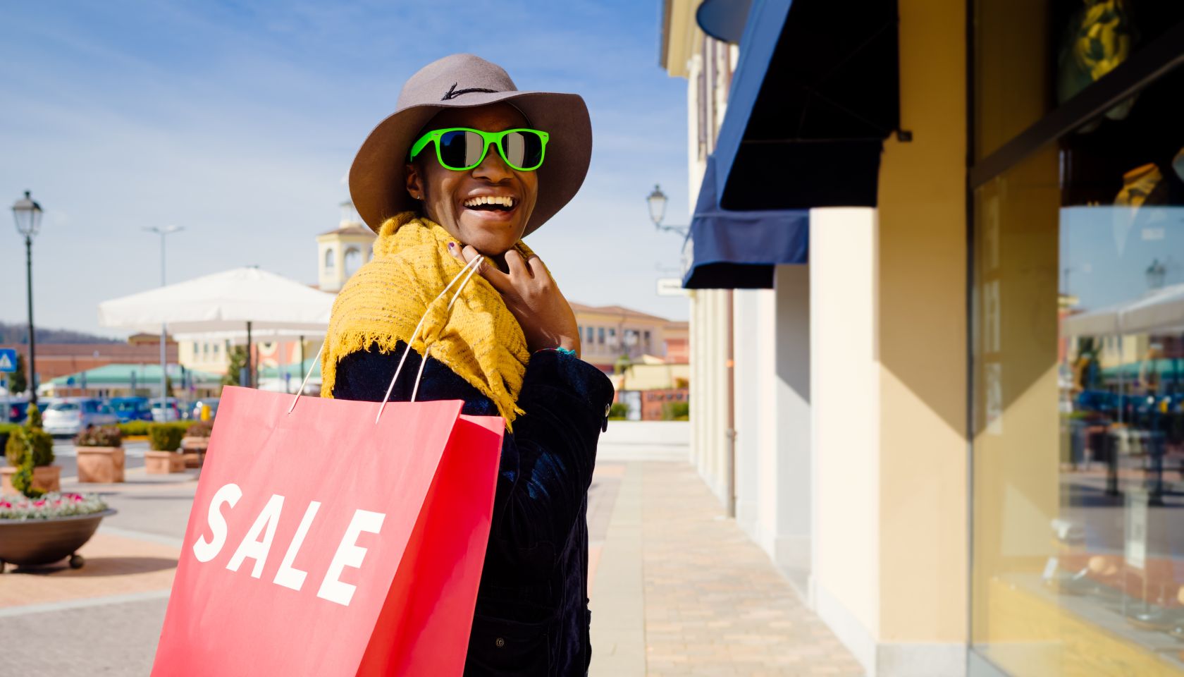 Young African woman during shopping day