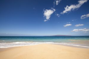 beach, ocean and clounds on tropical island.