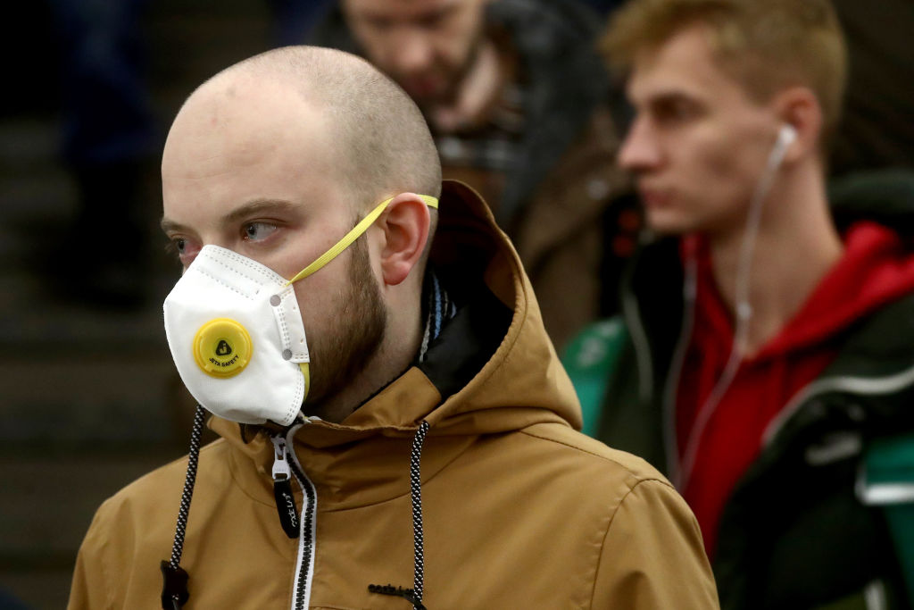 Commuters wear face masks on Moscow Underground