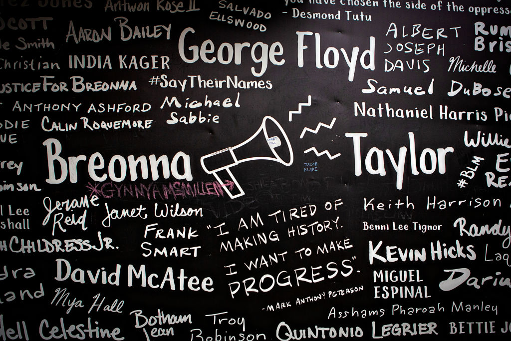 People protest a Kentucky grand jurys indictment of one of three police officers in the killing of Breonna Taylor, but not for her death