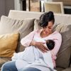 African-American mother nursing baby boy