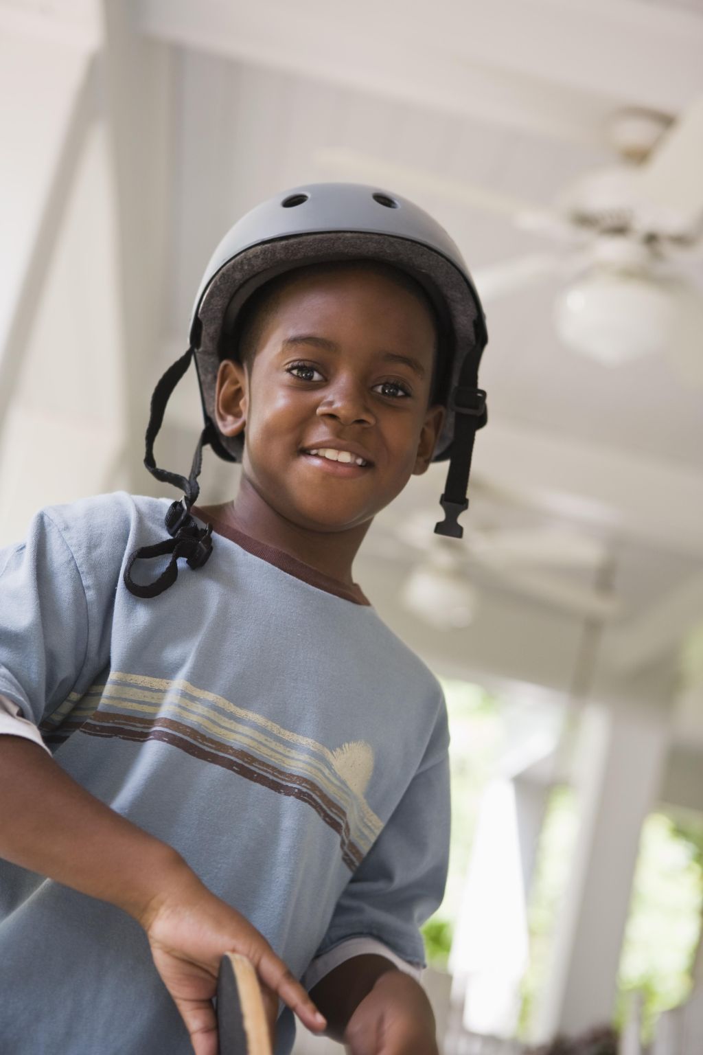 Smiling boy wearing a helmet
