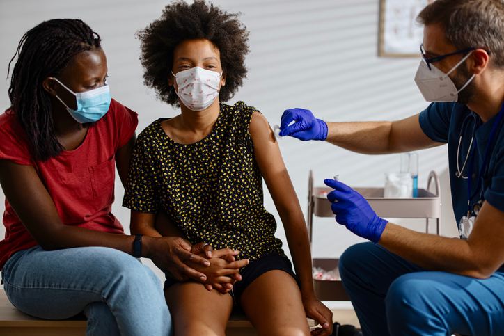 Little girl getting vaccinated