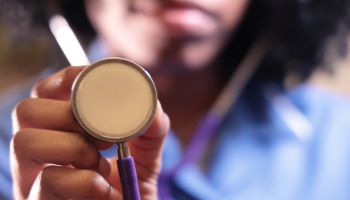 nurse holding stethoscope