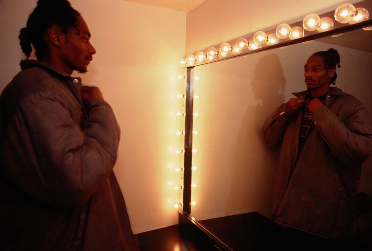 Snoop Doggy Dogg Preening in Front of Mirror