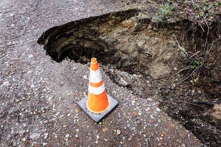 Sink hole with caution cone