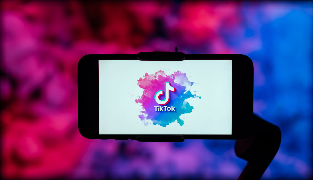 In this photo illustration, the TikTok logo is seen...