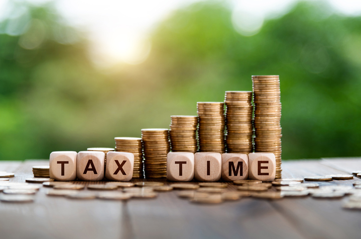 Coin steps with text tax time