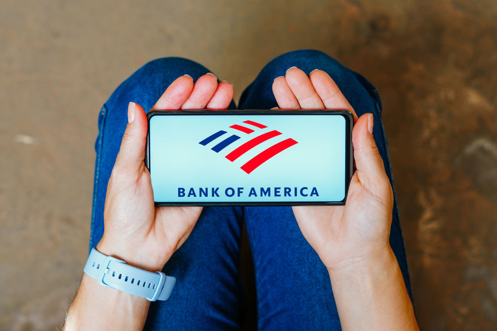 In this photo illustration, the Bank of America logo is...