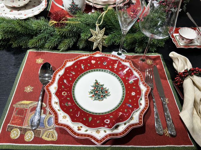 Christmas table setting on the red napkin. Close-up. Top view.
