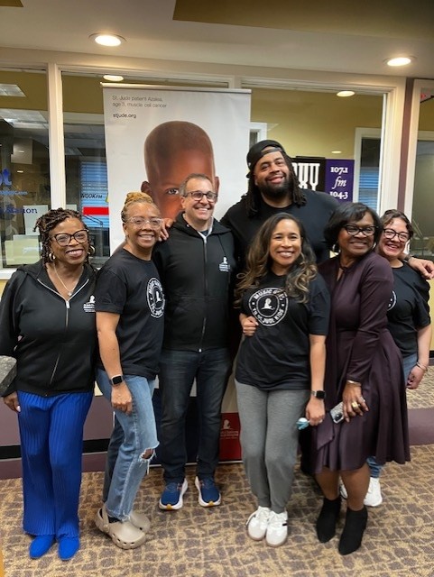 Ricci Law firm group picture St. Jude