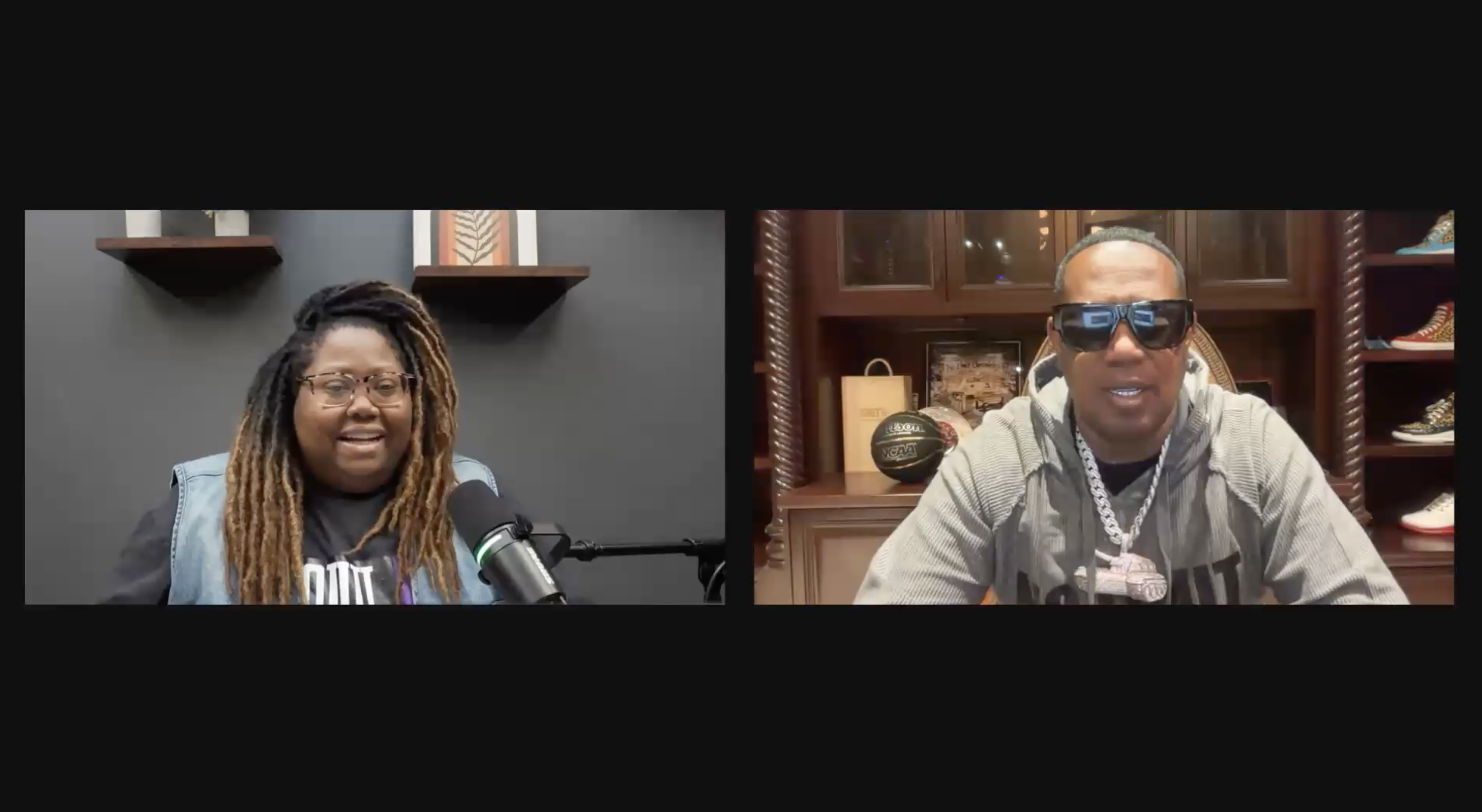 Two people in a recording studio setting - a person with dreadlocks speaking into a microphone, and a person wearing sunglasses and jewelry.