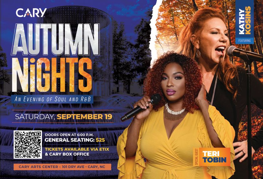 Two women with red hair performing on stage at an "Autumn Nights" event, with a backdrop of autumn trees and a venue sign.