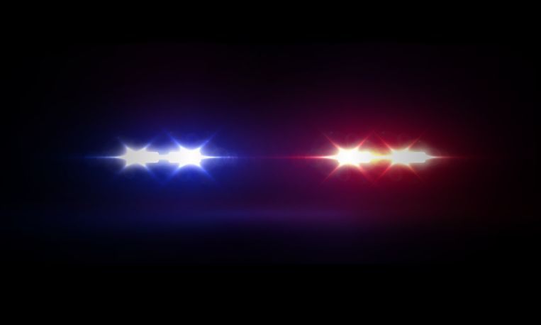 Emergency vehicle flashing blue and red lights